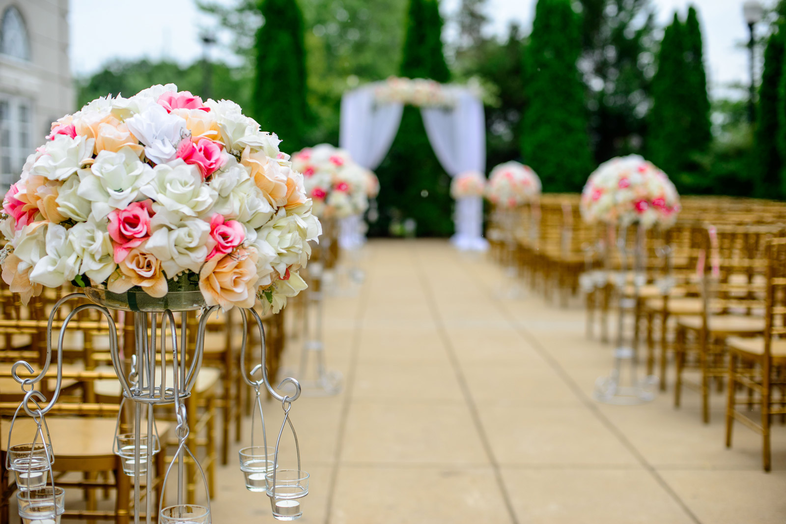 An elegantly decorated wedding venue set for a ceremony
