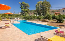 Traditional Stone Villas, Kalyves, Pool area with sunbeds