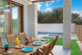 Villa Theasis, Agia Marina, exterior dining area 1