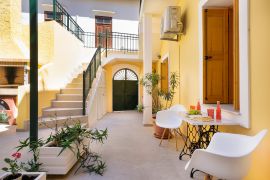 Mina Apartment, Каливес, dining table courtyard 1